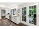 Well-lit kitchen with stainless steel appliances and access to the outdoor patio at 981 Sherwood Cir, Lancaster, SC 29720