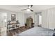 Comfortable bedroom showcasing hardwood floors, ceiling fan, and closet at 981 Sherwood Cir, Lancaster, SC 29720