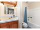 Bathroom featuring a vanity and shower at 103 Sadler Rd, Mount Holly, NC 28120