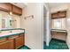 Bathroom with a vanity and a shower and a blue-green tiled floor at 103 Sadler Rd, Mount Holly, NC 28120