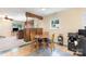 Cozy dining area featuring a round table, wood accents, and tile flooring at 103 Sadler Rd, Mount Holly, NC 28120