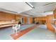 Spacious garage with ample storage space and workbench at 103 Sadler Rd, Mount Holly, NC 28120