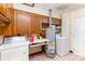 Functional laundry room with washer, dryer, and built-in storage cabinets at 103 Sadler Rd, Mount Holly, NC 28120