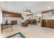 Spacious living room with a cozy brick fireplace, open layout, and ample natural light at 103 Sadler Rd, Mount Holly, NC 28120