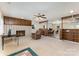 Spacious living room with a cozy brick fireplace, open layout, and ample natural light at 103 Sadler Rd, Mount Holly, NC 28120