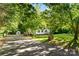 A spacious backyard features a shed and a well-kept lawn, creating a serene outdoor space at 1055 Cedar Hill Dr, Rockwell, NC 28138