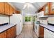 Updated kitchen with stainless steel appliances and a spacious layout at 1055 Cedar Hill Dr, Rockwell, NC 28138