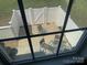 View of fenced backyard with patio furniture from inside at 11622 Lioness St, Charlotte, NC 28273