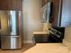 Bright kitchen includes stainless steel appliances and ample countertop space at 11622 Lioness St, Charlotte, NC 28273