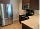 This remodeled kitchen features stainless steel appliances and modern countertops at 11622 Lioness St, Charlotte, NC 28273