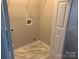 Laundry room with tiled floors and hookups at 11622 Lioness St, Charlotte, NC 28273