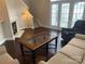 Comfortable living room with hardwood floors, fireplace, and view of stairs to the second floor at 11622 Lioness St, Charlotte, NC 28273