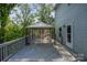 The house's back deck features an outdoor gazebo, and access to the home's rear entrance at 1175 Valley St # 111, Statesville, NC 28677