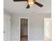 Hallway with two doorways to bedrooms, and one leading into a closet at 1175 Valley St # 111, Statesville, NC 28677