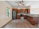 Modern kitchen featuring stainless steel appliances, updated cabinets, and granite countertops at 1175 Valley St # 111, Statesville, NC 28677