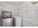 Functional laundry room with shelving, washer, and dryer at 1175 Valley St # 111, Statesville, NC 28677