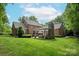 Beautiful backyard and brick home with a pergola at 12048 Royal Portrush Dr, Charlotte, NC 28277