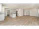 Open-concept living space featuring a modern kitchen and ample room for entertaining at 1208 Tarrington Ave, Charlotte, NC 28205
