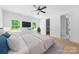 Serene main bedroom with hardwood floors, a large window, ample closet space, and neutral decor at 13109 Homewood Dr, Charlotte, NC 28262