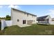 Backyard with patio, trampoline, shed, and fence, perfect for outdoor activities at 13315 Hunting Birds Ln, Charlotte, NC 28278