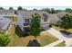 Traditional two-story home with a manicured lawn and attached two-car garage at 13315 Hunting Birds Ln, Charlotte, NC 28278