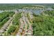Aerial view of the community highlighting proximity to the lake and community pool at 135 Canoe Pole Ln, Mooresville, NC 28117