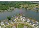 Incredible aerial view showcases the community's lake access and lakefront homes at 135 Canoe Pole Ln, Mooresville, NC 28117