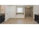 Bathroom features a soaking tub and glass enclosed walk-in shower at 135 Canoe Pole Ln, Mooresville, NC 28117