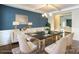 This dining room showcases elegant decor and ample seating around a stylish table at 135 Canoe Pole Ln, Mooresville, NC 28117