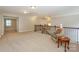Spacious open loft area with chair and direct access to several rooms at 135 Canoe Pole Ln, Mooresville, NC 28117