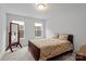 Cozy bedroom with carpeted floors and abundant natural light streaming through the windows at 154 Cotton Field Dr, Statesville, NC 28677