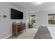 Cozy bedroom featuring a dresser, mounted TV, chair, and soft carpet at 154 Cotton Field Dr, Statesville, NC 28677