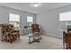 Inviting living room featuring comfortable seating, a coffee table, and ample natural light at 154 Cotton Field Dr, Statesville, NC 28677