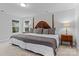 Spacious primary bedroom featuring a large bed, and windows on either side of the bed at 154 Cotton Field Dr, Statesville, NC 28677