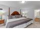 Spacious main bedroom featuring a large bed, soft pillows, and carpeted floors at 154 Cotton Field Dr, Statesville, NC 28677