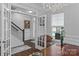 Stylish home office featuring a glass door, neutral paint, natural light, and elegant decor at 154 Cotton Field Dr, Statesville, NC 28677