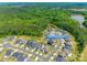 An aerial view of the neighborhood and community of houses surrounding a body of water at 1540 Striped Bass Ln, Clover, SC 29710