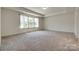 Expansive primary bedroom with natural light and neutral decor at 1540 Striped Bass Ln, Clover, SC 29710