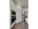 Close up of built-in stainless steel microwave and oven appliances in a modern kitchen at 1540 Striped Bass Ln, Clover, SC 29710