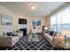 Inviting living room with a fireplace, stylish furniture, and a large area rug at 1540 Striped Bass Ln, Clover, SC 29710