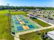 Overhead view of vibrant pickleball courts and baseball field, ready for recreation at 1540 Striped Bass Ln, Clover, SC 29710