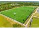 Aerial view of a expansive multi-use soccer field complete with well trimmed grass and soccer goals at 1540 Striped Bass Ln, Clover, SC 29710