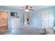 Cozy bedroom featuring soft blue walls, carpet, and a mounted TV at 1724 Virginia St, Monroe, NC 28110