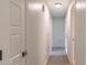 Bright hallway with multiple doors leading to various rooms in the house at 1724 Virginia St, Monroe, NC 28110