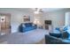 Bright living room with plush sofas, a ceiling fan, and a large window at 1724 Virginia St, Monroe, NC 28110