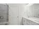 Bathroom with double sinks, white cabinets, tile floor, and enclosed shower at 2031 Skyhawk Dr, York, SC 29745