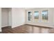 Comfortable bedroom featuring hardwood floors, large windows, and neutral wall color at 2031 Skyhawk Dr, York, SC 29745