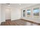 Bright bedroom with hardwood floors and large windows offers a serene retreat at 2031 Skyhawk Dr, York, SC 29745