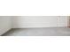 Bedroom featuring carpet flooring and white walls, leading to a wood-floored hallway at 2031 Skyhawk Dr, York, SC 29745