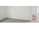 Clean, carpeted room offers a view into an adjacent room, showcasing the home's open layout at 2031 Skyhawk Dr, York, SC 29745